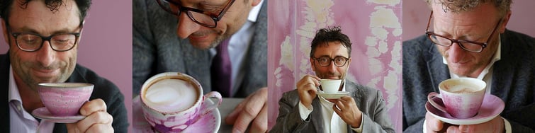 Medium shot of a 40yr old Australian business man with glasses drinking coffee --sref 1537316939