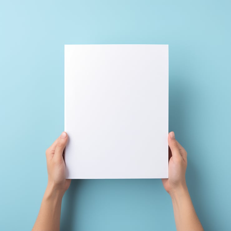 Hand holding a magazine mockup
